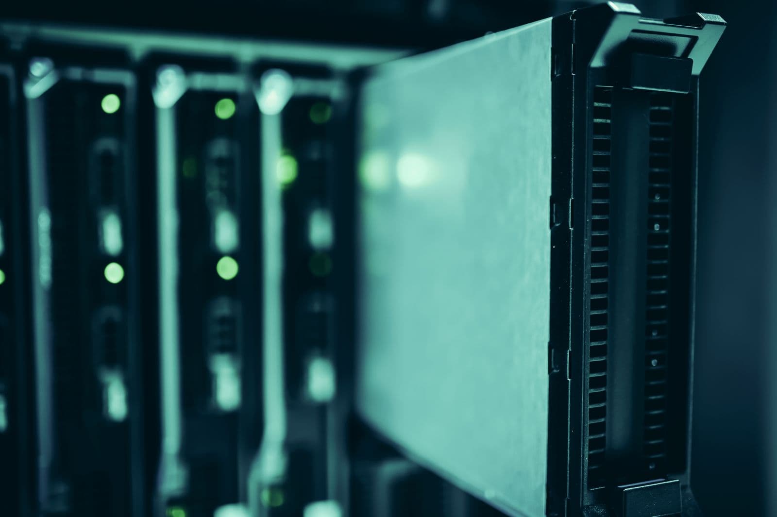 Rows of server racks with cabling in a data centre